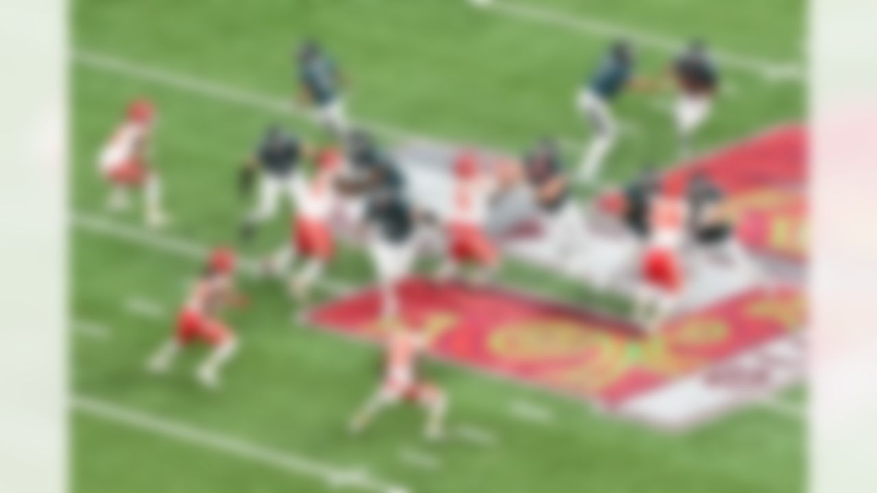 Philadelphia Eagles quarterback Jalen Hurts (1) hands the ball off to running back Saquon Barkley (26) during the NFL Super Bowl LIX football game against the Kansas City Chiefs on Sunday, February 9, 2025 in New Orleans, Louisiana.
